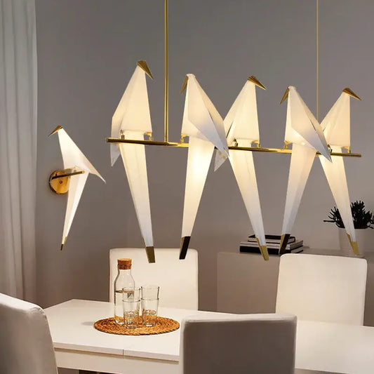 Elegant white origami crane bird design led pendant light with gold-toned metal accents for dining room decorbites bird design