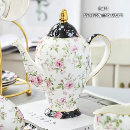 Ornate 18th century scene bone china tea pot with pink green floral decorbites bone china and gold trim accents