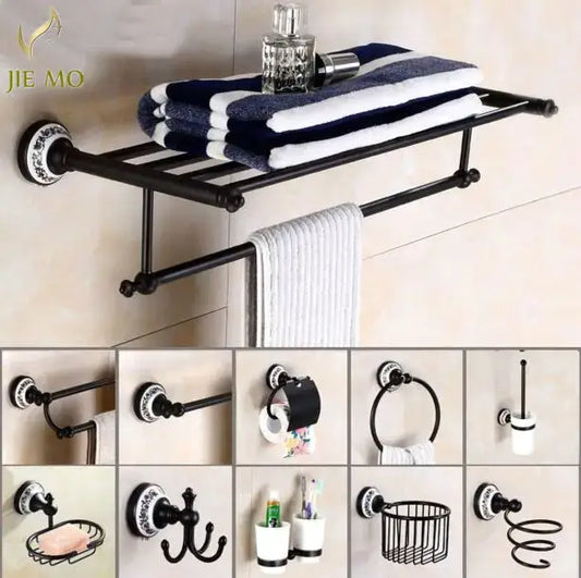 Ornate black wrought iron towel rack with white patterned circular mounting plate in bathroom accessories set