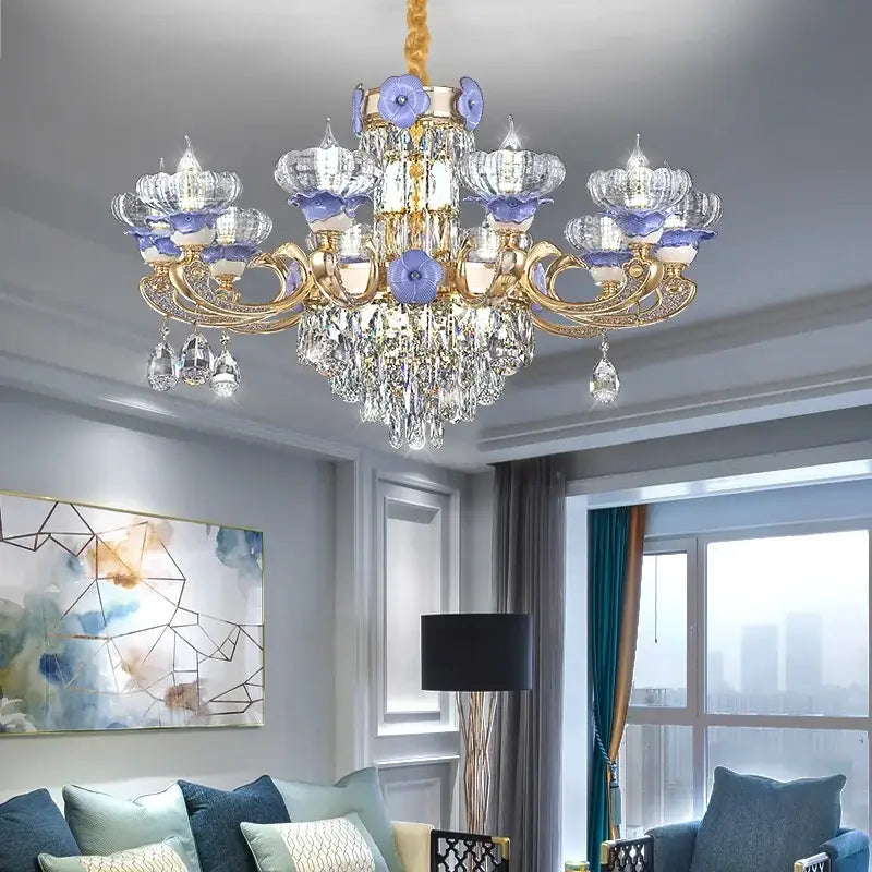 Elegant gold-toned decorbites crystal candle chandelier with crystal droplets and purple glass flowers for staircase lighting