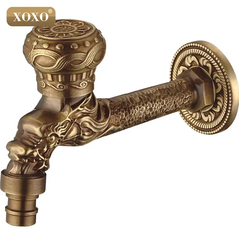 Antique brass-finished decorbites dragon style faucet tap featuring ornate embossed dragon head design for outdoor use