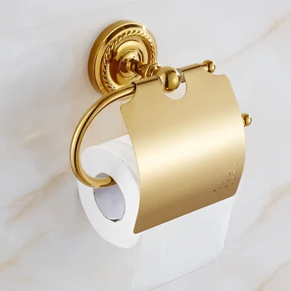 Ornate brass gold toilet paper holder with gold finish and scrollwork in decorbites brass gold bathroom hardware set