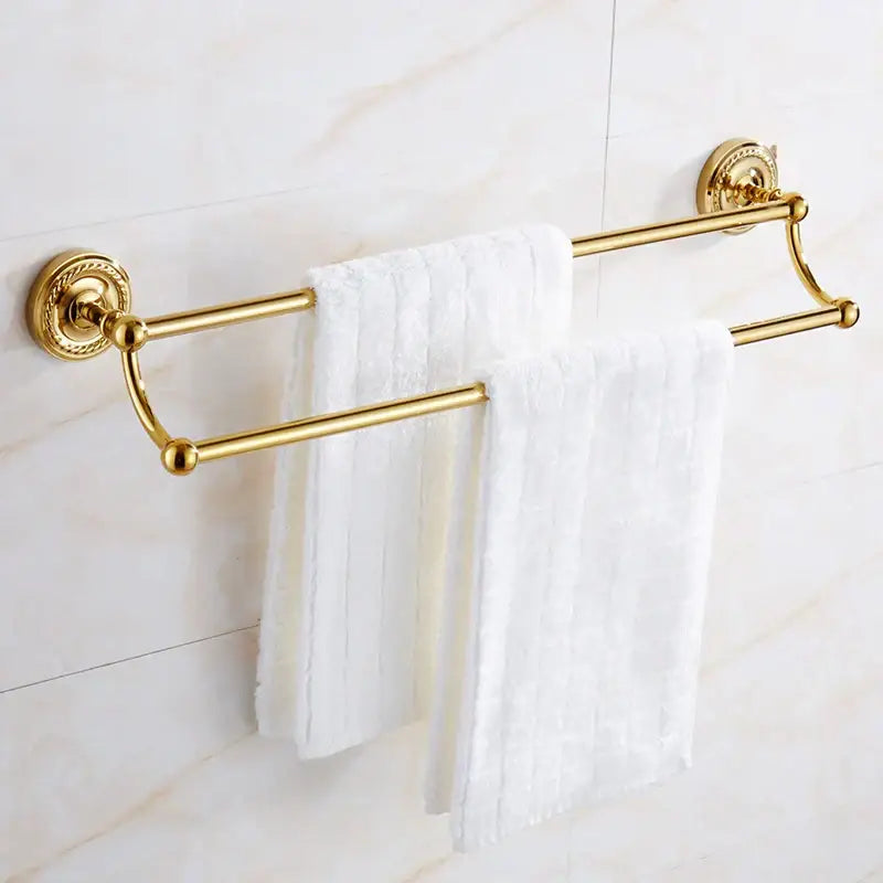 Ornate brass gold double-tiered towel rack with circular wall mounts and polished bars in brass gold bathroom decorbites hardware set