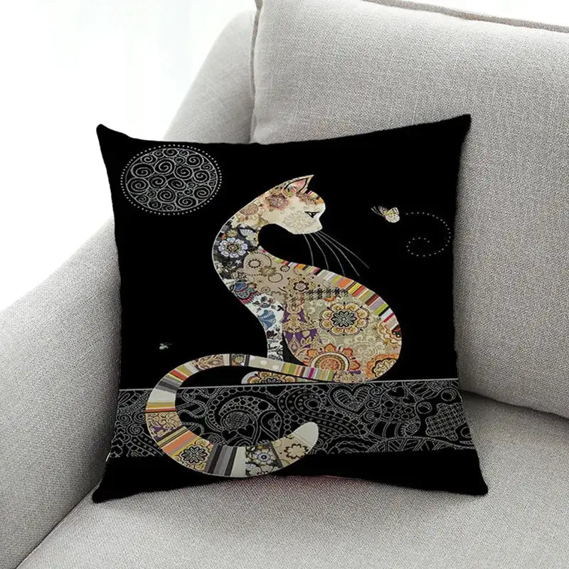 Black linen pillowcase featuring a decorbites cat design with intricate patchwork patterns and gold accents for living room decor