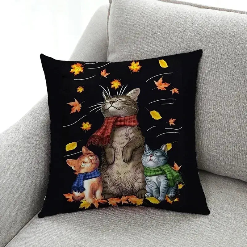 Black linen design pillowcase featuring decorbites cat design with three cats in autumn scarves and falling leaves for living room decor