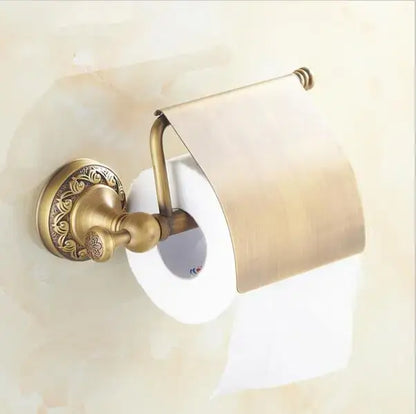 Antique brass toilet paper holder with ornate floral detailing in decorbites copper carved bathroom accessories set