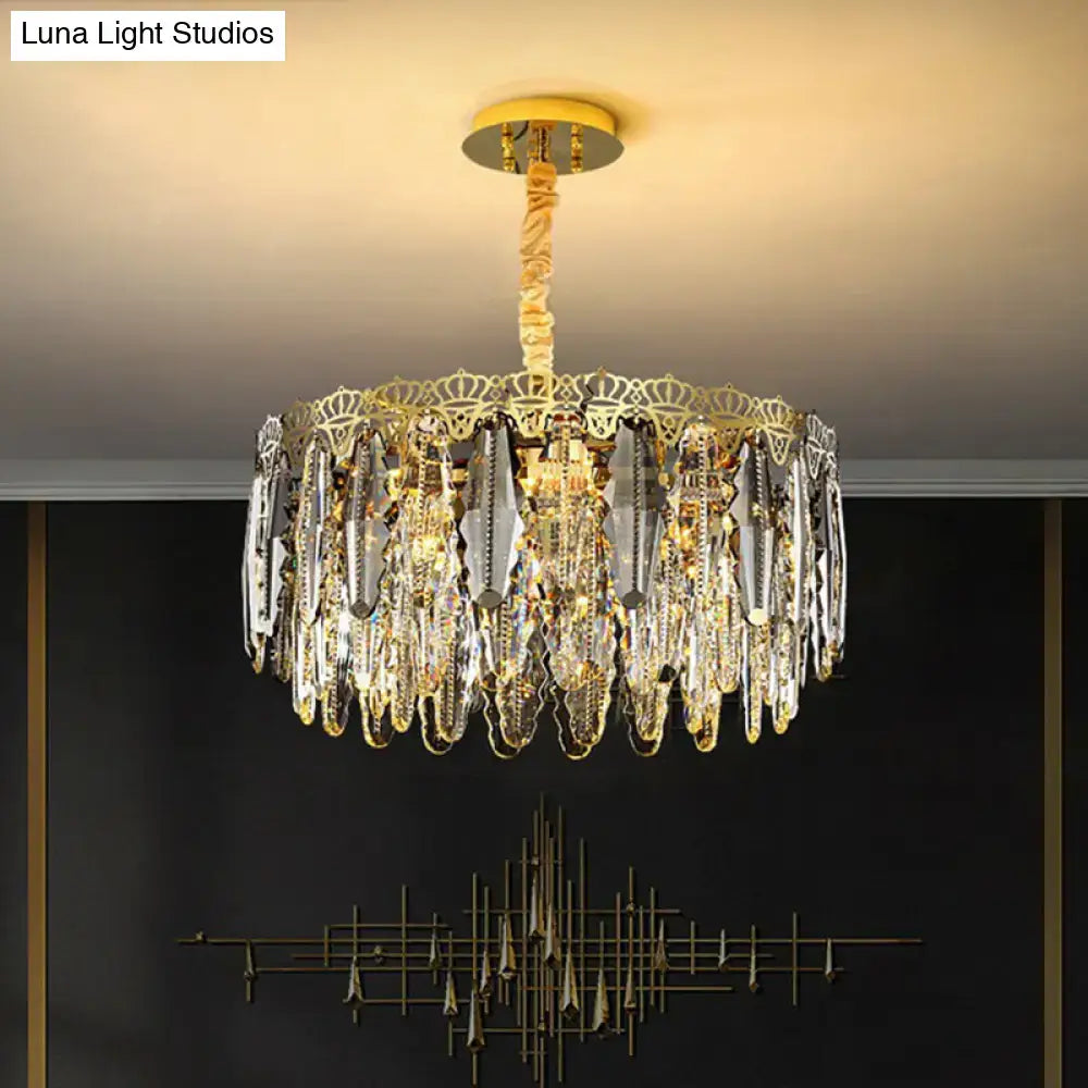Gold-toned DecorBites™ minimalist crystal leaf pendant light with clear crystal teardrops and ornate crown frame fixture width