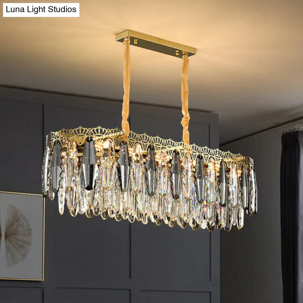 DecorBites™ minimalist crystal leaf pendant light with gold-toned frame and clear crystal teardrop pendants fixture width