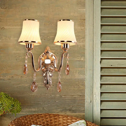 Ornate gold crystal wall sconce with two cream fabric shades and e26 e27 bulb base for led incandescent fluorescent bulbs