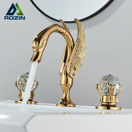 Ornate gold swan basin faucet by rozin with crystal handles and feathered wings for elegant bathroom decorbites gold swan