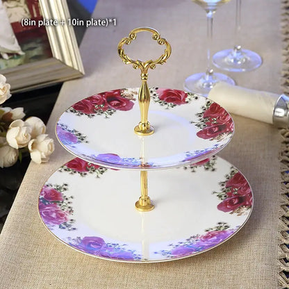 Two-tiered porcelain fruit plates set with gold ornate handle and red and purple floral pattern for dining room