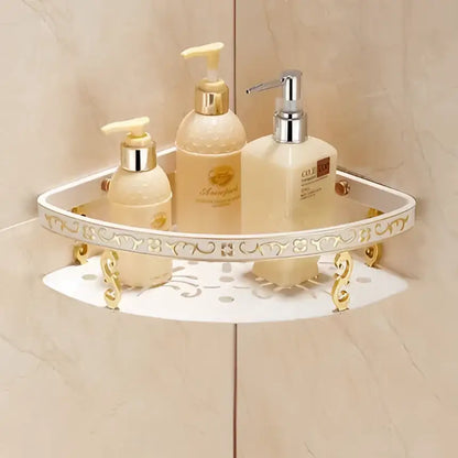 Ornate gold and white floral corner shelf with decorative metal legs holding beige lotion bottles in decorbites bathroom accessories set