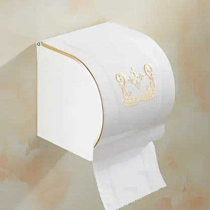 White toilet paper holder with gold ornate detailing and curved design in decorbites bathroom accessories set