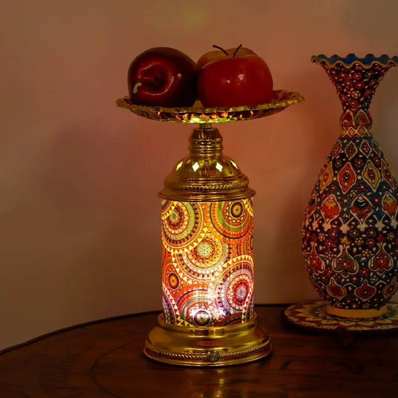 Ornate golden mosaic fruit platter desk lamp with intricate circular patterns in warm orange red and gold tones for bedroom decorbites fruit platter