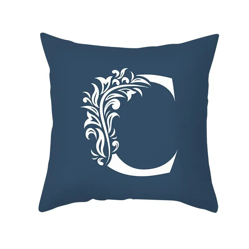 Ornate navy blue letter pillowcase featuring a white floral c design, perfect decorbites blue letter living room decorbites blue