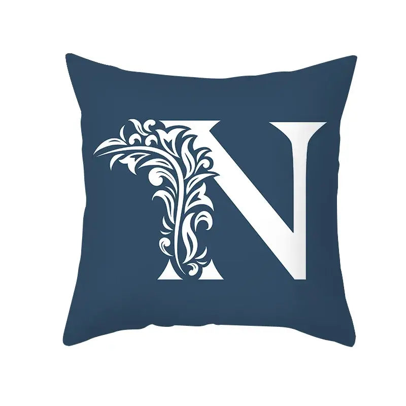 Navy blue throw pillow with a large white ornate letter n floral design blue letter pillowcase decorbites blue letter