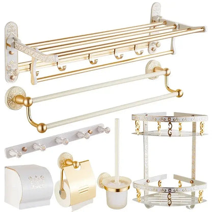 Ornate white and gold bath hardware set with decorative floral patterns by decorbites bath for elegant bathroom decor