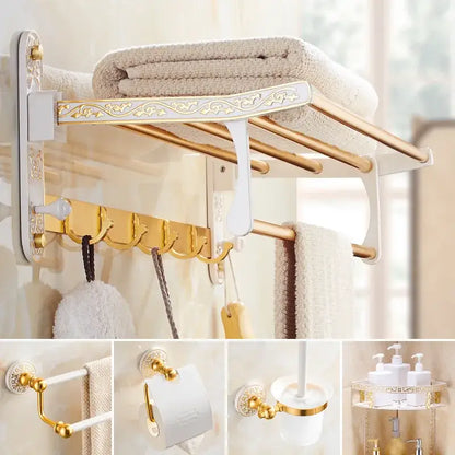 Ornate white and gold decorbites bath hardware set with scrollwork, multiple towel bars, and hooks for bathroom organization