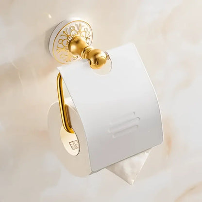 Ornate gold-toned toilet paper holder with floral detailing from decorbites bath hardware set for elegant bathroom decor