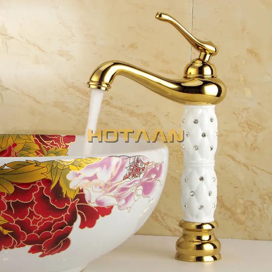Ornate white and gold brass basin faucet with diamond embellishments and curved spout by decorbites basin faucet