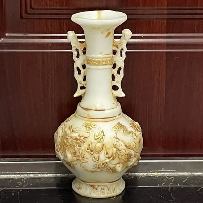 Ornate off-white porcelain vase with gold-leaf jade dragons and cloud motifs featuring openwork handles for decorbites white marble decor