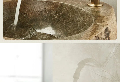 Rustic stone sink with a single hole antique brass outdoor antifreeze faucet featuring a 360° swivel spout