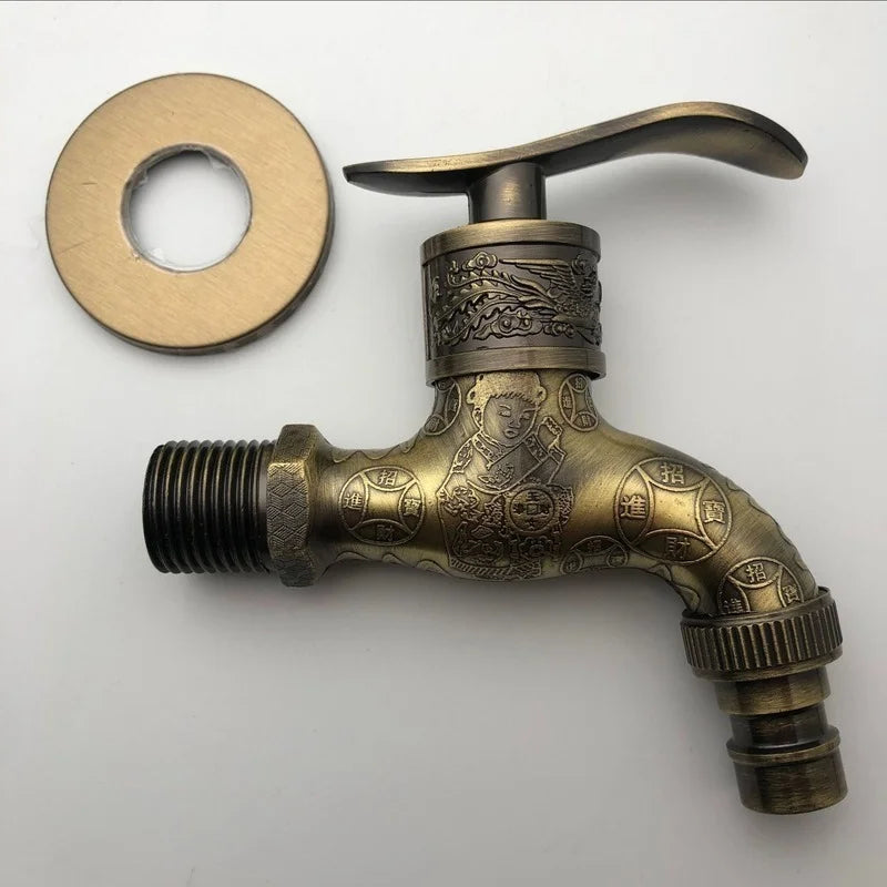 Antique brass wall mounted outdoor faucet with intricate child engraving and chinese characters with matching washer