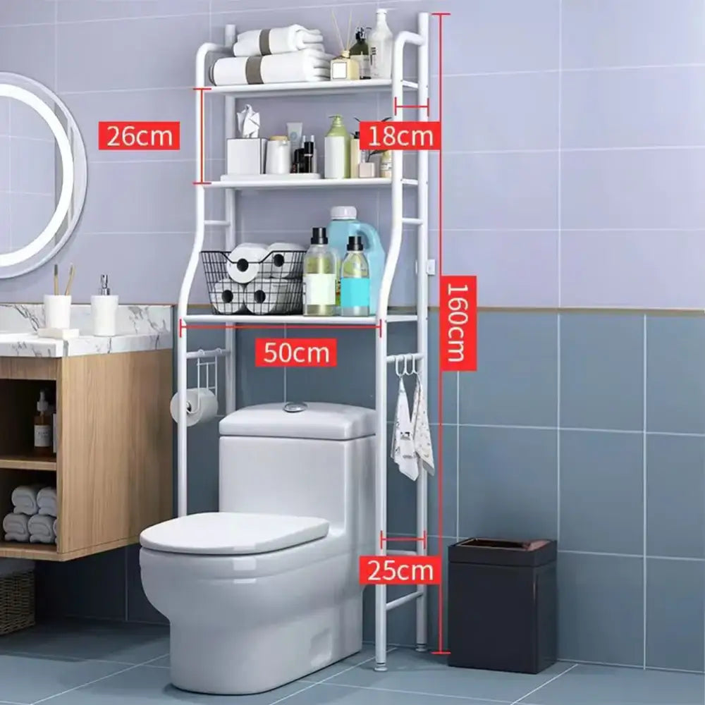 White metal DecorBites™ 3-tier over toilet storage shelf with wire basket and towel hooks for vertical space use