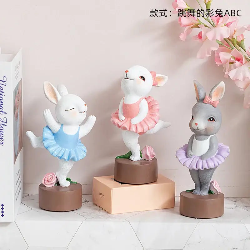 Three pastel ballet rabbit dancer sculptures with tutus and bows for bedroom desk decor