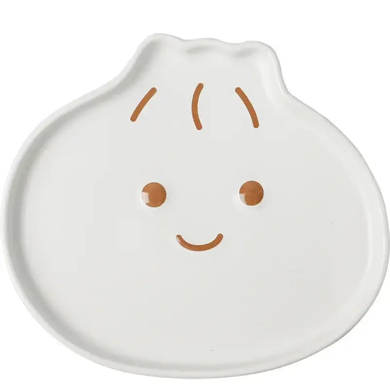 White ceramic dumpling shaped plate with brown facial features from decorbites cloud tulip cartoon dog tableware collection