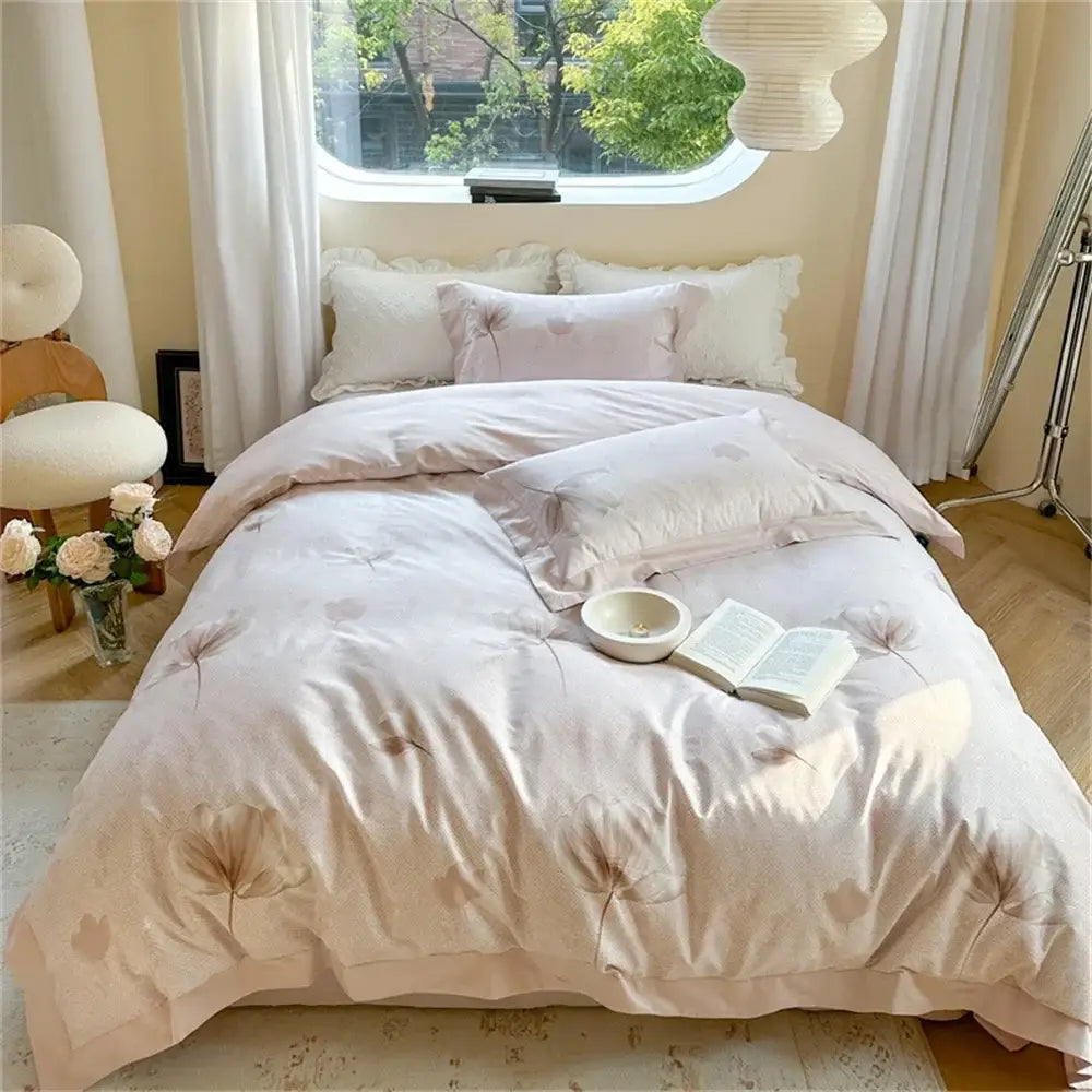 A soft blush pink satin duvet cover set with delicate dandelion seed embroidery from decorbites colorful bedding set