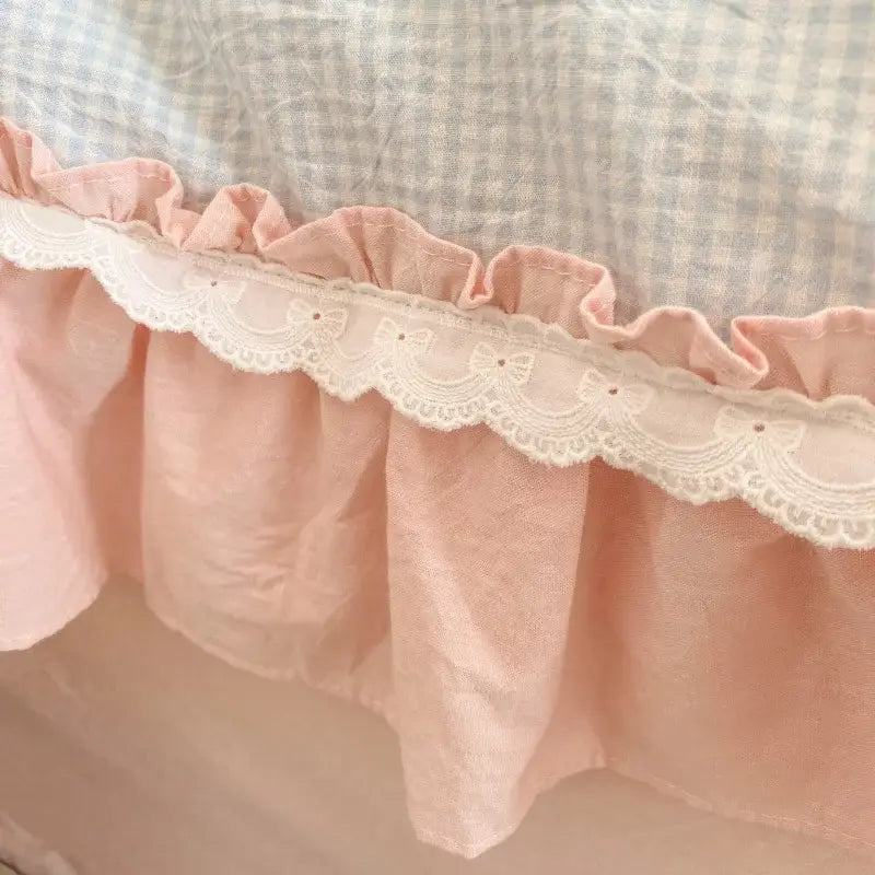 Pink ruffled cotton bed skirt with white lace trim and embroidered bows from decorbites blue pink lattice bedding set