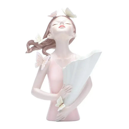 Delicate pink resin butterfly girl figurine holding white fan with butterflies, ideal as a flower vase ornament for living room