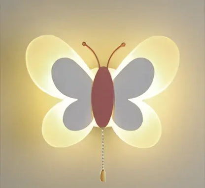 A pastel butterfly girl room lamp wall sconce with soft glowing translucent white wings and maroon body decorbites butterfly girl