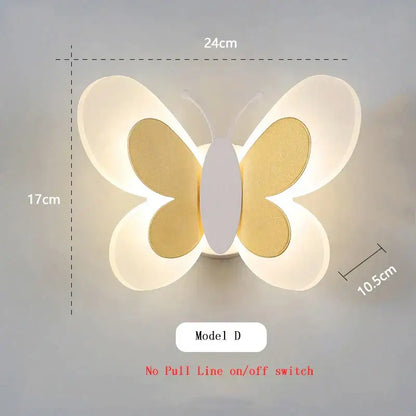 A modern pastel butterfly wall lamp with illuminated white wings and gold-toned inner sections for kids bedroom decorbites butterfly wall lamp
