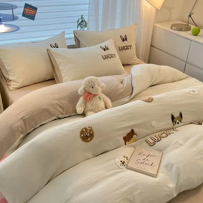 Cream-colored pastel cartoon embroidered cotton bedding set with lucky bunny motifs and soft plush decorbites cartoon embroidered texture