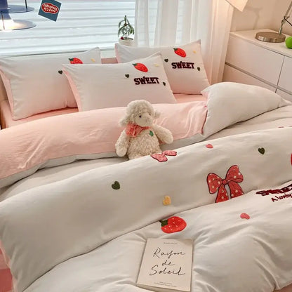 Soft white cotton bedding set with strawberry and bow cartoon embroidered details from decorbites for bedroom