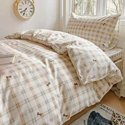 Cream-colored pastel checkered cotton grid bedding set with subtle brown blue stripes and small bowtie prints
