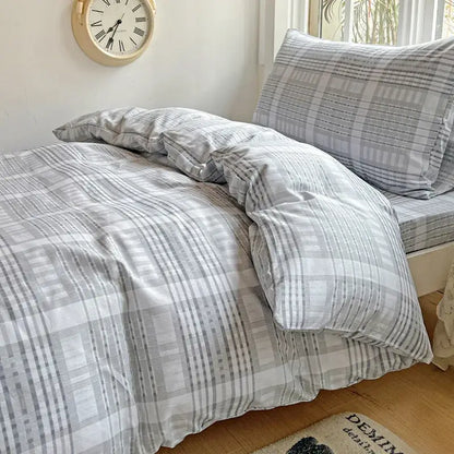 Gray and white plaid bedding set with a soft textured fabric featuring a cotton grid pattern by decorbites