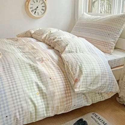 Pastel checkered cotton printed student bedding set featuring soft embroidered cartoon characters and star details decorbites cotton printed