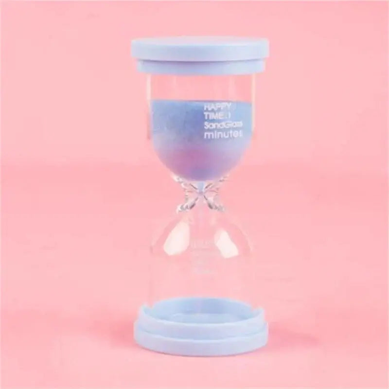 Pastel colorful glass hourglass sand timer with gradient purple to pink sand and blue plastic caps for kids bedroom decorbites hourglass sand