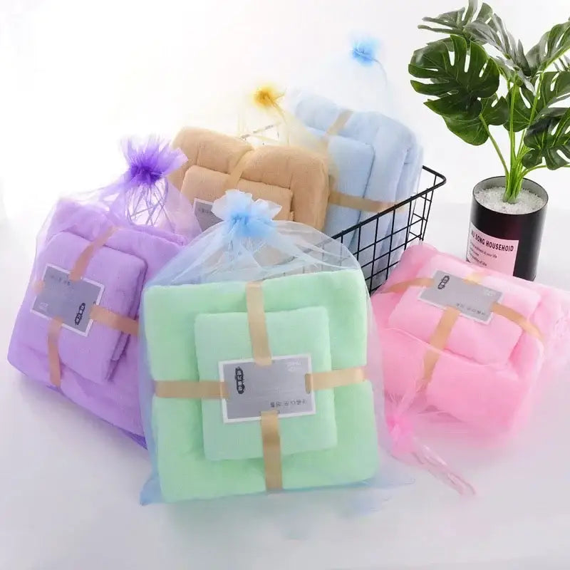 Pastel green coral velvet bath towel set in clear mesh packaging with gold ribbon ties soft absorbent velvet bath towel