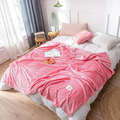 Pink ribbed fleece decorbites cozy hug blanket with soft plush texture and subtle vertical ridges perfect as a soft sweatshirt throw