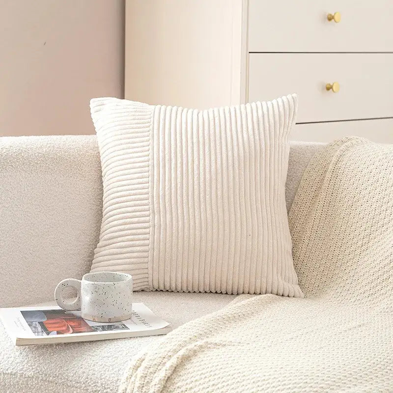 Cream-colored corduroy striped body pillow with vertical ribbed texture for bedroom lumbar support decorbites corduroy striped
