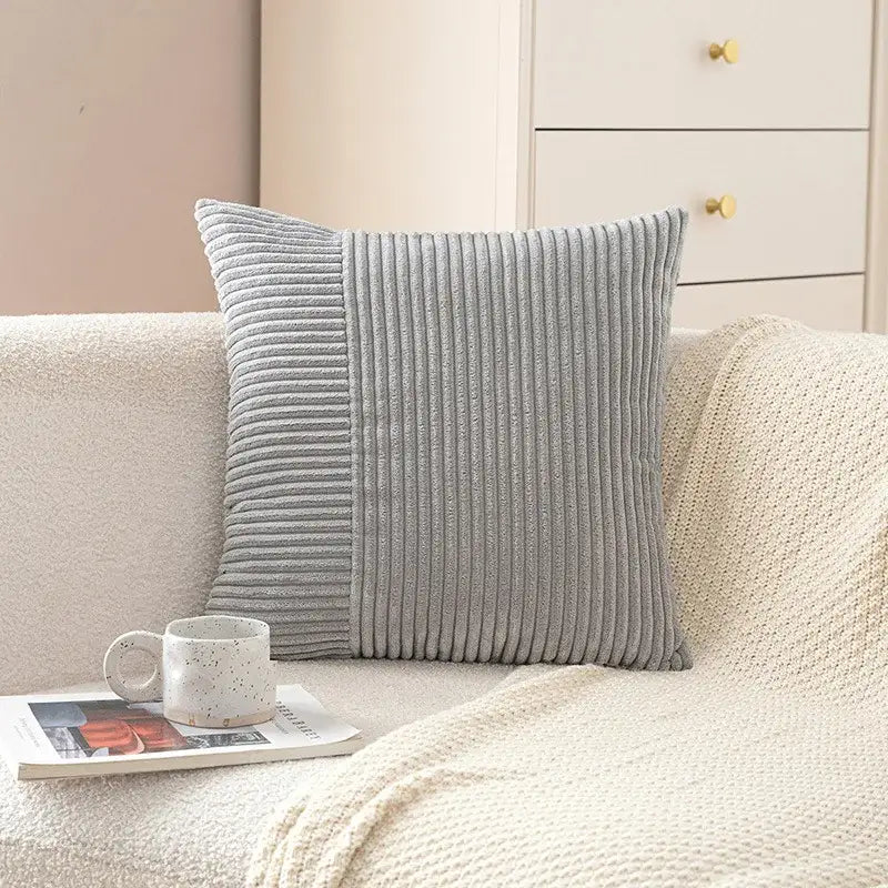Gray corduroy striped body pillow with textured ribbed surface for lumbar support in pastel decorbites corduroy striped design