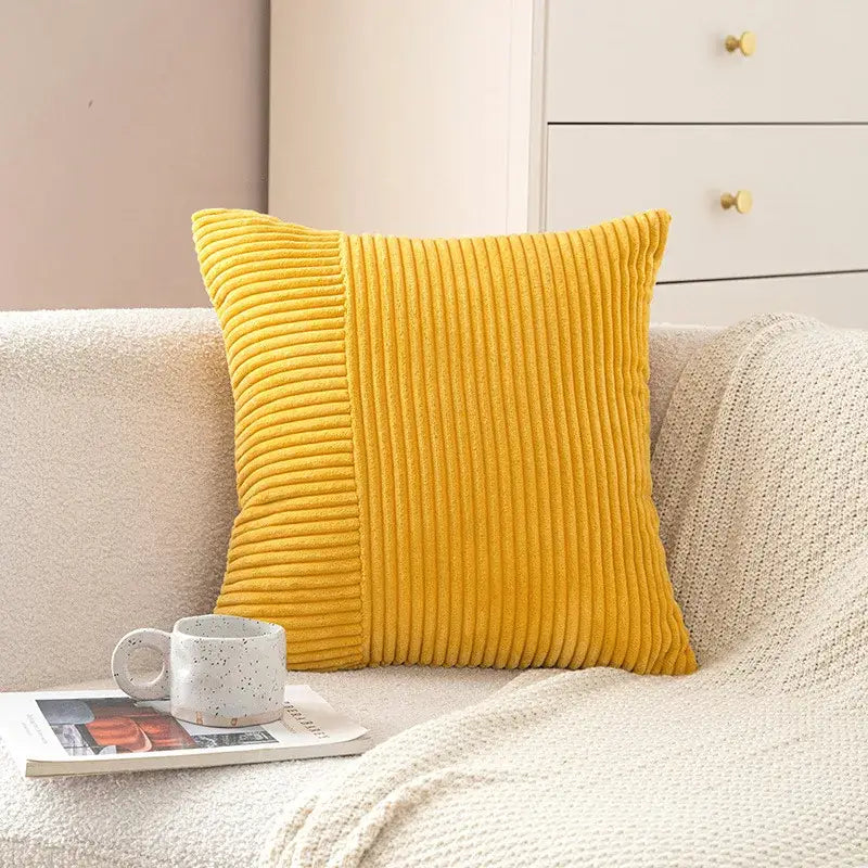 Vibrant yellow corduroy striped body pillow with textured ribbed surface for decorbites corduroy striped lumbar support