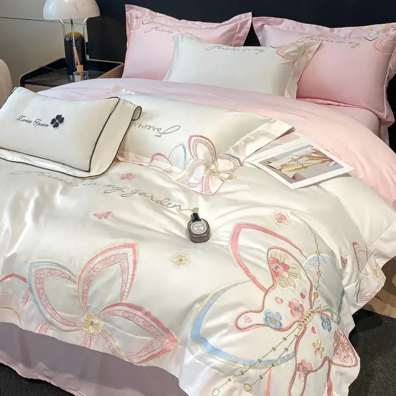 Pastel embroidered butterfly flowers bedding set with satin duvet cover featuring pink blue and gold embroidery
