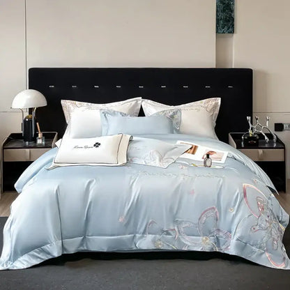Light blue satin bedding set featuring decorbites embroidered butterfly flowers for elegant bedroom decor
