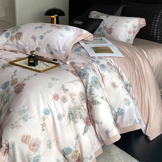 Pastel floral flowers prints bedding set in satin with soft pink blue and lavender blossoms on creamy background