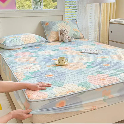 Pastel floral quilted latex fitted sheet set with soft breathable fabric in blues pinks and greens for bedroom use